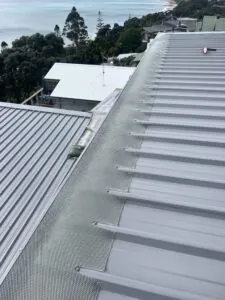 HDPE gutter guard installed on a deck roof in New Zealand